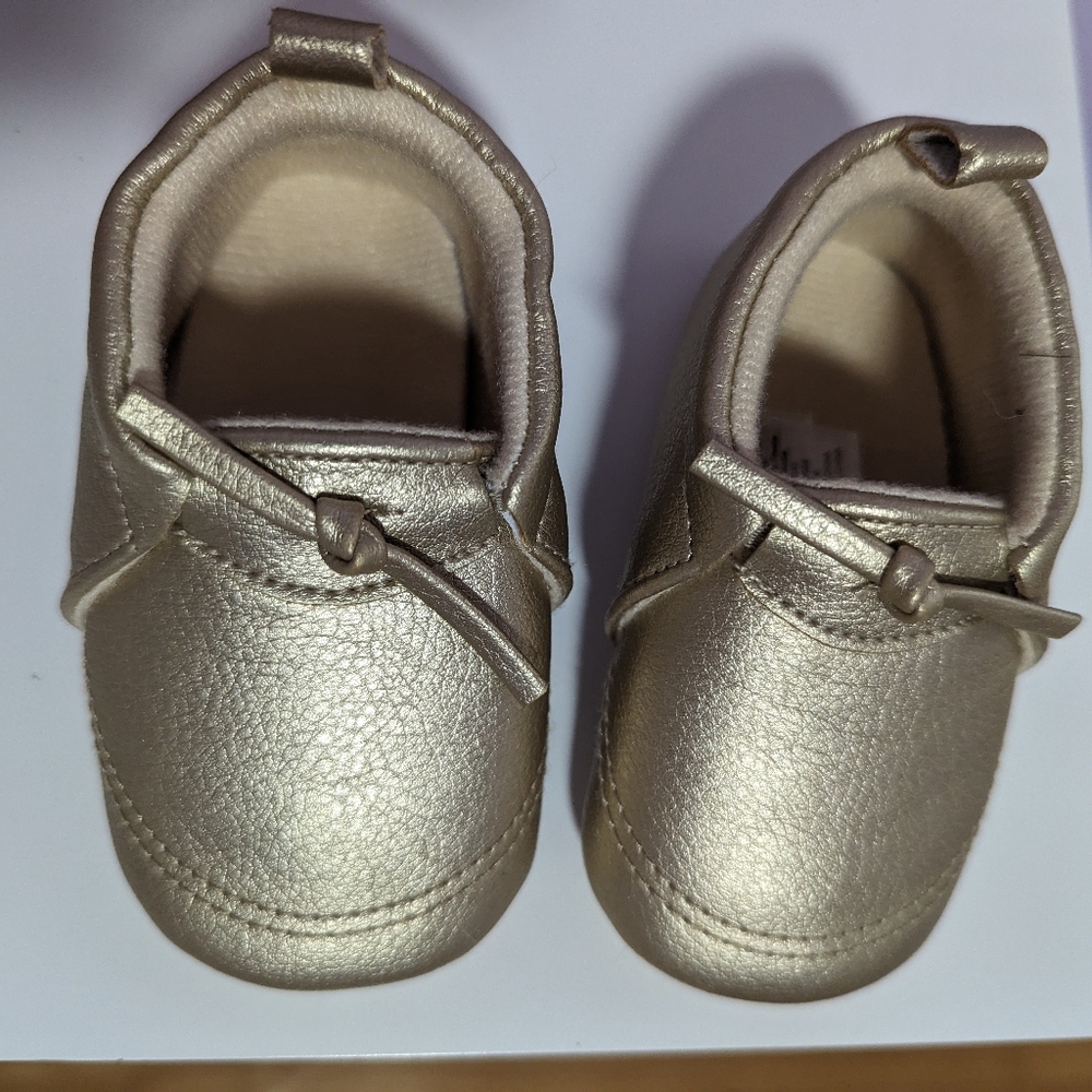Size 9-12 gold baby moccasins